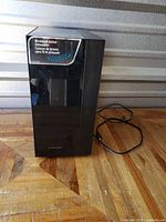 Front view of Samsung wireless active subwoofer with label visible
