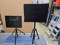 Both music stands side by side showing relative sizes and overall design