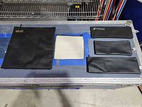 Overview of all five pouches on surface