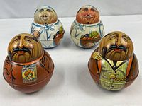 Front view of all four Bristol Ware tins