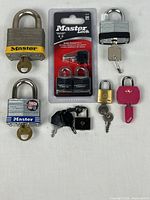 Group shot of all nine padlocks and keys
