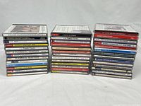 Three stacks of classical CD jewel cases, showing overall quantity