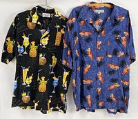 Both Hawaiian shirts hanging front view