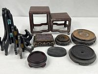 Group shot of all twelve wooden stands