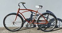 Full left side view showing entire bicycle, frame style, fenders, wheels