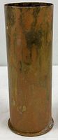 Full view of brass artillery shell casing