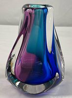 Full view of asymmetrical multi-colored Sommerso glass vase
