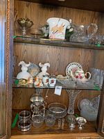 Full cabinet view of all items on three shelves