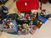 overview of totes filled with holiday decorations