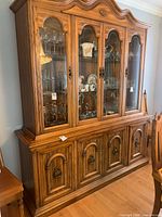 Full frontal view of entire china cabinet