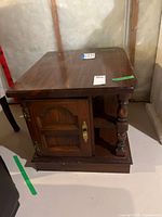 front view showing cabinet door, shelf, overall form