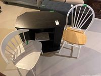 Overall view of both chairs and media stand