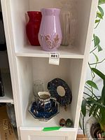 Overall view of lot on shelving showing all items