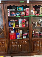 Full view of wooden cabinet with shelves and lower doors