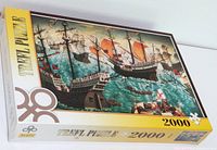 Front of sealed Trefl 2000-piece puzzle box showing pirate ship artwork