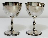 Front view of both silverplated goblets standing side by side