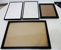 All four black frames laid out front view