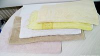 Stacked view of all five towels showing color variety and texture