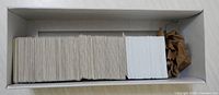 Cardboard slide storage box containing large group of slides