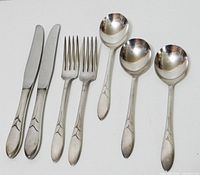 Entire seven-piece flatware set laid out