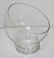 Front view showing slanted rim and pedestal base