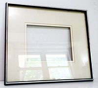 Front view of frame showing glass, mat and overall appearance