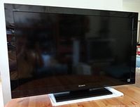 Front view of Sony Bravia 40-inch TV on stand