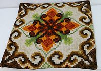Front view showing embroidered design and colors