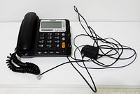 Full view of VTech CD1281 telephone with handset, coiled cord and AC adapter
