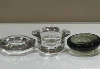 All three glass items side by side: Val St Lambert ashtray, Rosenthal candleholder, Holmegaard bowl