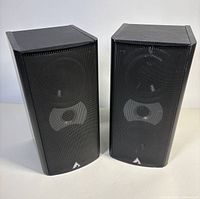 Full view of both Atlantic Technology 2200 LR speakers with grilles attached