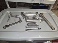 Group shot of all wrenches on tote lid