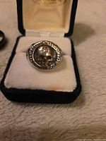 Close-up of Harley-Davidson skull ring in display box