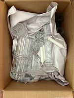 Boxed view of several crystal pieces, shows packing condition