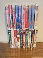 Front view of all 20 sealed VHS tapes in two rows