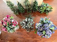 Group view showing all artificial plants and flower arrangements