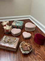 Group shot of all jewelry boxes and pincushions