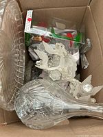 Box containing mixed crystal and glass items