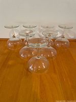 Seven upside-down coupes showing bowl size and foot