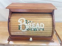 front view closed showing lettering and knob