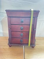 Front view closed showing four drawers and finish