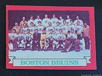 Front of O-Pee-Chee Boston Bruins team card #93 showing team photo and border