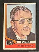 Front view of Fred Shero O-Pee-Chee card showing image and Flyers logo