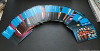 Fronts of curved stack showing colour images and blue borders