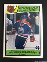 Front of Wayne Gretzky 1983-84 OPC Record Breaker card #212