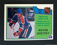 Front of 1983-84 O-Pee-Chee Wayne Gretzky Assist Leader card #216