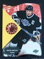 Front of Wayne Gretzky Pinnacle Border Battle card showing action image, team logo, card title