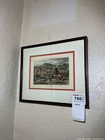 Framed print on wall, full view