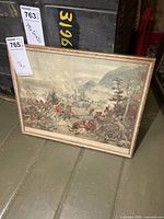 Full view of framed print showing battle scene