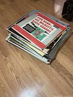 Stack of vintage marching and pipe band LPs on floor